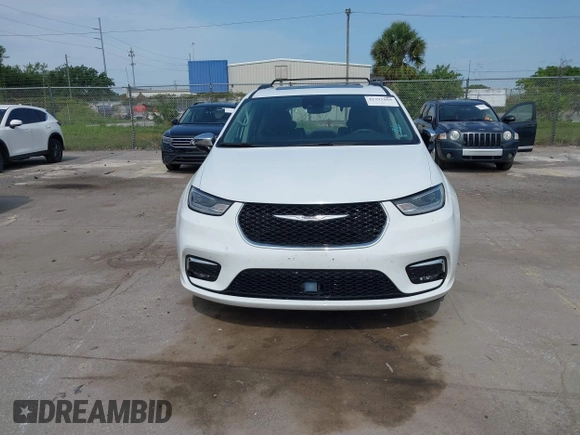 2023 Chrysler Pacifica Limited with VIN 2C4RC1GG7PR566163, listed as a IAAI auction lot 42393988 with 59,354 mi miles and . Bid and sale history available at DreamBid. Image 12.