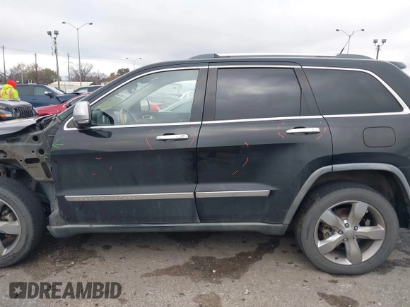 2011 Jeep Grand Cherokee Overland with VIN 1J4RS6GT7BC518123, listed as a IAAI auction lot 41277374 with 163,752 mi miles and . Bid and sale history available at DreamBid. Image 14.