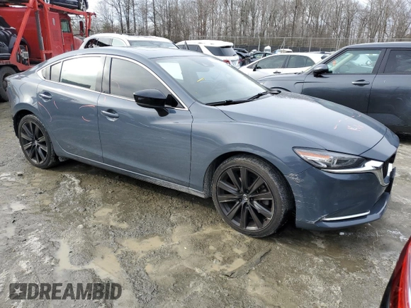 2021 Mazda 6 Carbon Edition with VIN JM1GL1WY9M1616420, listed as a Copart auction lot 41511095 with 50,236 mi miles and Salvage Title. Bid and sale history available at DreamBid. Image 4.