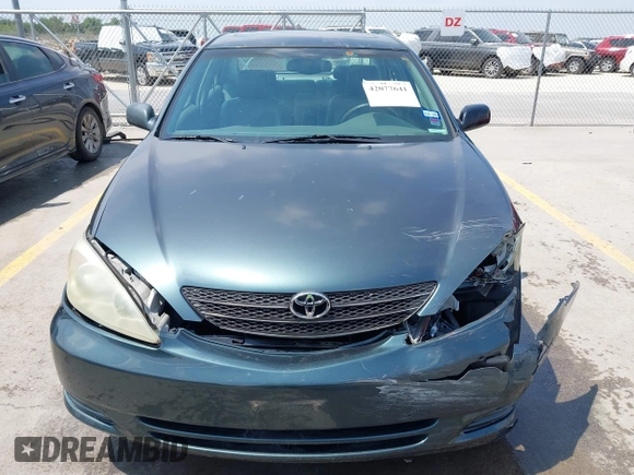 2002 Toyota Camry LE z VIN 4T1BE30KX2U591037, wystawiony jako IAAI lot #42077641 z przebiegiem 86 569 mil mil oraz . Historia ofert i sprzedaży dostępna na DreamBid. Obrazek 12.