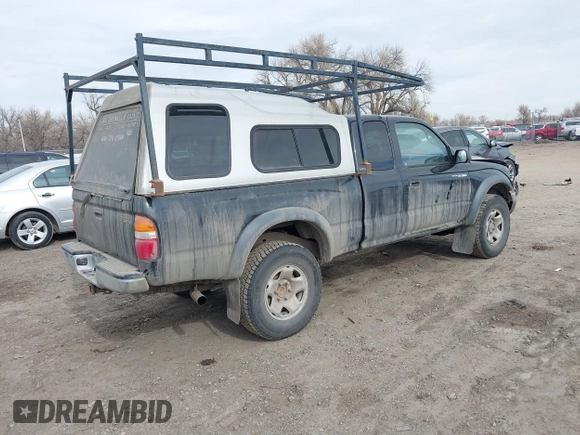 2003 Toyota Tacoma with VIN 5TEWN72N53Z176334, listed as a IAAI auction lot 41774810 with 190,543 mi miles. Bid and sale history available at carsss.com. Image 4.