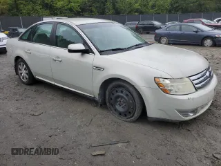 2008 Ford Taurus SEL with VIN 1FAHP24W78G154447, listed as a Copart auction lot 73690124 with 175,261 mi miles and Salvage Title. Bid and sale history available at carsss.com. Image 4.