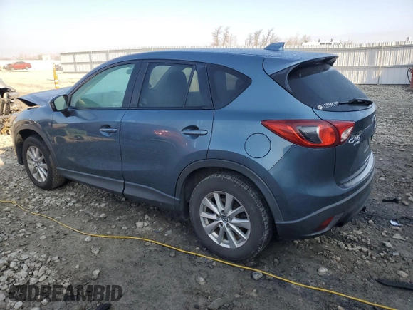 2015 Mazda CX-5 Touring with VIN JM3KE4CY0F0446748, listed as a Copart auction lot 51924585 with 111,402 mi miles and Clean Title. Bid and sale history available at DreamBid. Image 2.