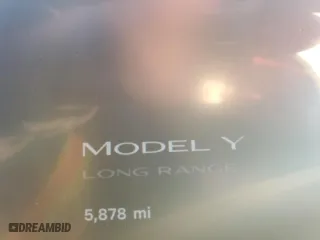 2024 Tesla Model Y with VIN 7SAYGDED1RF154851, listed as a Copart auction lot 87863255 with 5,878 mi miles and Salvage Title. Bid and sale history available at carsss.com. Image 9.