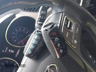 2016 Hyundai Santa Fe z VIN 5XYZU3LB3GG341634, wystawiony jako IAAI lot #42690921 z przebiegiem 149 571 mil mil oraz . Historia ofert i sprzedaży dostępna na DreamBid. Obrazek 11.