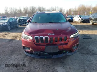 2019 Jeep Cherokee Latitude Plus with VIN 1C4PJMLB9KD410730, listed as a IAAI auction lot 41762344 with 82,097 mi miles and . Bid and sale history available at carsss.com. Image 12.