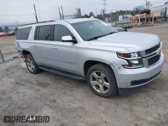 2018 Chevrolet Suburban LT z VIN 1GNSCHKC1JR394991, wystawiony jako IAAI lot #41192222 z przebiegiem 90 313 mil mil oraz . Historia ofert i sprzedaży dostępna na DreamBid. Obrazek 1.