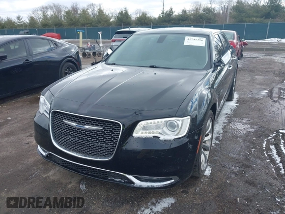 2016 Chrysler 300 with VIN 2C3CCAET8GH295839, listed as a IAAI auction lot 41741356 with 83,587 mi miles. Bid and sale history available at carsss.com. Image 2.