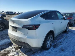 2022 Tesla Model Y Long Range z VIN 7SAYGDEE1NA009664, wystawiony jako Copart lot #41533925 z przebiegiem 36 126 mil mil oraz Szkody całkowita. Historia ofert i sprzedaży dostępna na DreamBid. Obrazek 3.