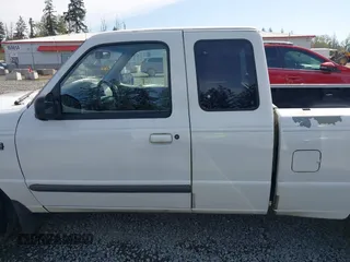 1999 Ford Ranger XLT with VIN 1FTYR14X0XPA65325, listed as a IAAI auction lot 42009611 with 218,657 mi miles. Bid and sale history available at carsss.com. Image 15.