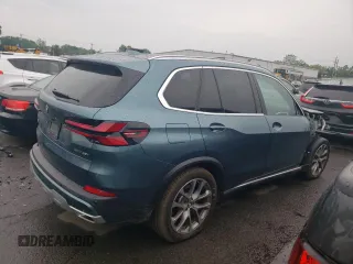 2024 BMW X5 xDrive40i with VIN 5UX23EU02R9T63818, listed as a Copart auction lot 60195525 with 26,773 mi miles and Salvage title. Bid and sale history available at DreamBid. Image 3.