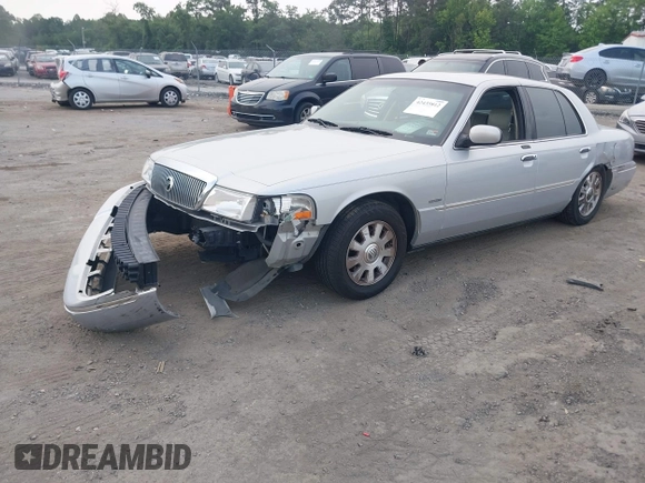2003 Mercury Grand Marquis LS Premium z VIN 2MEFM75W03X658118, wystawiony jako IAAI lot #42435812 z przebiegiem 174 893 mil mil oraz . Historia ofert i sprzedaży dostępna na DreamBid. Obrazek 2.