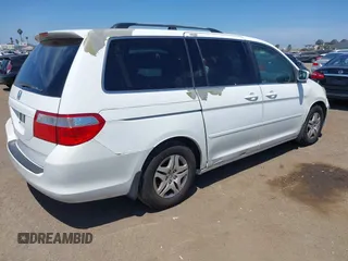 2007 Honda Odyssey EX with VIN 5FNRL38487B075936, listed as a IAAI auction lot 42052061 with 188,279 mi miles and . Bid and sale history available at DreamBid. Image 4.