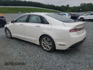 2015 Lincoln MKZ z VIN 3LN6L2G95FR626407, wystawiony jako Copart lot #63658825 z przebiegiem 121 361 mil mil oraz Szkoda całkowita • Salvage title. Historia ofert i sprzedaży dostępna na DreamBid. Obrazek 2.