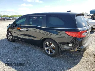 2019 Honda Odyssey Touring with VIN 5FNRL6H84KB014970, listed as a Copart auction lot 53571835 with 116,219 mi miles and Salvage title. Bid and sale history available at DreamBid. Image 2.