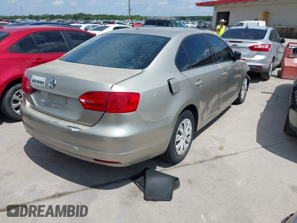2014 Volkswagen Jetta S with VIN 3VW2K7AJ7EM248945, listed as a IAAI auction lot 42689148 with 80,517 mi miles and . Bid and sale history available at DreamBid. Image 4.