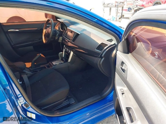 2017 Mitsubishi Lancer ES with VIN JA32U2FU3HU007384, listed as a IAAI auction lot 41875124 with 114,819 mi miles. Bid and sale history available at carsss.com. Image 5.