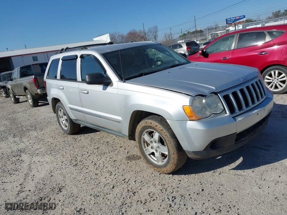 2010 Jeep Grand Cherokee Laredo with VIN 1J4PS4GKXAC103153, listed as a IAAI auction lot 41760743 with 185,138 mi miles. Bid and sale history available at carsss.com. Image 1.