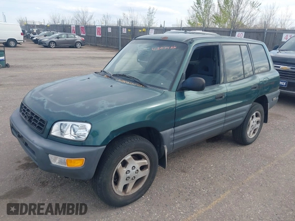 1998 Toyota RAV4 with VIN JT3GP10V5W0026814, listed as a IAAI auction lot 42003456 with 196,842 mi miles and . Bid and sale history available at DreamBid. Image 2.