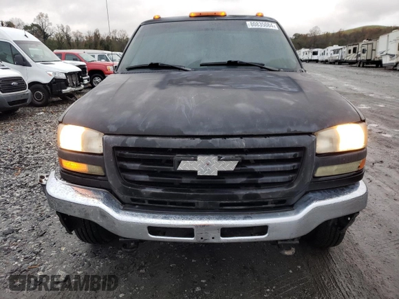 2007 GMC Sierra 3500 DRW Work Trk z VIN 1GTJK33D87F124104, wystawiony jako Copart lot #80835084 z przebiegiem 321 629 mil mil oraz Szkody całkowita. Historia ofert i sprzedaży dostępna na DreamBid. Obrazek 5.