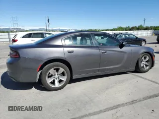 2015 Dodge Charger SXT with VIN 2C3CDXHG9FH856319, listed as a Copart auction lot 57251335 with 171,454 mi miles and Salvage title. Bid and sale history available at DreamBid. Image 3.