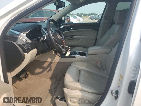 2013 Cadillac SRX Performance Collection with VIN 3GYFNDE30DS568330, listed as a Copart auction lot 59057005 with 163,817 mi miles and Salvage title. Bid and sale history available at DreamBid. Image 7.