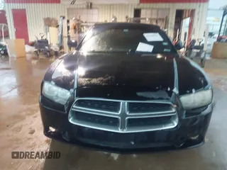 2014 Dodge Charger SE with VIN 2C3CDXBG8EH240828, listed as a IAAI auction lot 42158404 with 211,686 mi miles and . Bid and sale history available at DreamBid. Image 12.