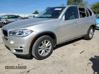 2014 BMW X5 xDrive35i with VIN 5UXKR0C55E0H23681, listed as a Copart auction lot 52183885 with 142,290 mi miles and Salvage Title. Bid and sale history available at carsss.com. Image 1.