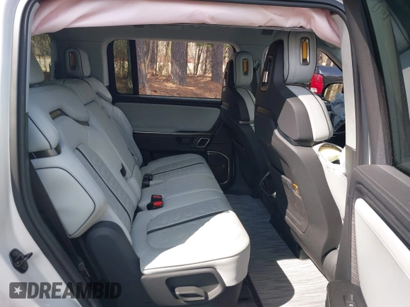 2023 Rivian R1S Launch Edition with VIN 7PDSGABL5PN006609, listed as a IAAI auction lot 41903200 with Not Provided miles. Bid and sale history available at carsss.com. Image 8.