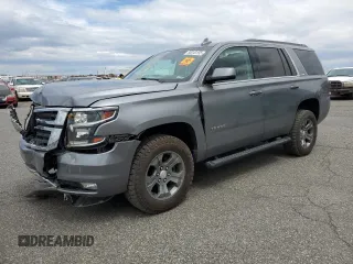 2019 Chevrolet Tahoe LT with VIN 1GNSKBKC8KR292864, listed as a Copart auction lot 58243155 with 64,675 mi miles and Salvage title. Bid and sale history available at DreamBid. Image 1.