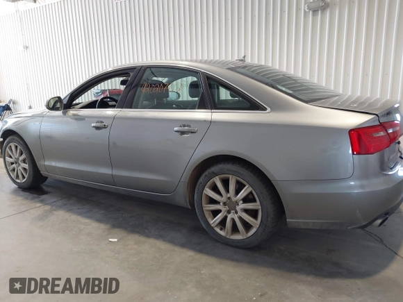 2013 Audi A6 Premium Plus z VIN WAUGGAFC3DN066310, wystawiony jako IAAI lot #42020702 z przebiegiem 195 939 mil mil oraz . Historia ofert i sprzedaży dostępna na DreamBid. Obrazek 15.