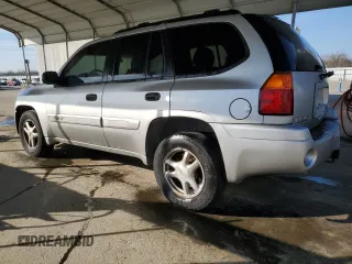 2005 GMC Envoy SLE with VIN 1GKDS13S852374516, listed as a Copart auction lot 42409725 with 299,816 mi miles and Salvage Title. Bid and sale history available at carsss.com. Image 2.
