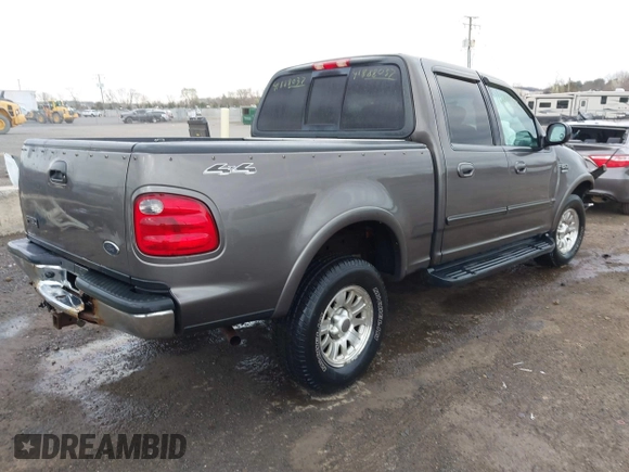 2003 Ford F-150 XLT with VIN 1FTRW086X3KA54557, listed as a IAAI auction lot 41888037 with 217,512 mi miles. Bid and sale history available at carsss.com. Image 4.