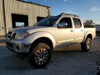 2012 Nissan Frontier SL with VIN 1N6AD0ER2CC441189, listed as a Copart auction lot 76611994 with 170,754 mi miles and Salvage title. Bid and sale history available at DreamBid. Image 1.