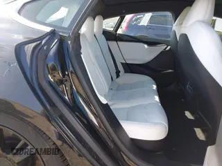 2020 Tesla Model S Long Range with VIN 5YJSA1E23LF381872, listed as a IAAI auction lot 41763046 with 96,720 mi miles and . Bid and sale history available at DreamBid. Image 8.