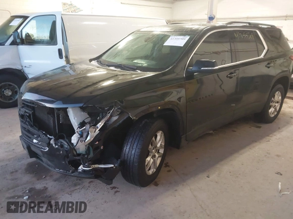 2021 Chevrolet Traverse LT Cloth with VIN 1GNEVGKW4MJ175358, listed as a IAAI auction lot 41355709 with 148,257 mi miles. Bid and sale history available at carsss.com. Image 2.