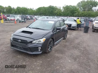 2018 Subaru WRX Premium with VIN JF1VA1C68J9832942, listed as a IAAI auction lot 42266390 with 104,946 mi miles and . Bid and sale history available at DreamBid. Image 2.