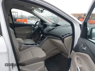 2015 Ford Escape SE with VIN 1FMCU0GXXFUB96076, listed as a IAAI auction lot 40914596 with 134,066 mi miles. Bid and sale history available at carsss.com. Image 5.