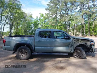 2022 Toyota Tacoma SR z VIN 3TMCZ5AN5NM518961, wystawiony jako IAAI lot #42148345 z przebiegiem 43 009 mil mil oraz . Historia ofert i sprzedaży dostępna na DreamBid. Obrazek 13.