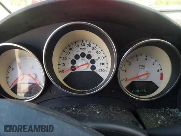 2009 Dodge Caliber SXT with VIN 1B3HB48A69D150199, listed as a Copart auction lot 51043165 with 218,125 mi miles and Clean Title. Bid and sale history available at DreamBid. Image 9.