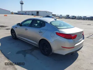 2015 Kia Optima LX with VIN 5XXGM4A78FG477630, listed as a IAAI auction lot 41771874 with 107,065 mi miles and . Bid and sale history available at DreamBid. Image 3.