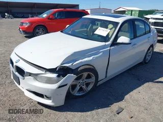 2014 BMW 3 Series 320i with VIN WBA3B1C59EP678908, listed as a IAAI auction lot 41774738 with 143,975 mi miles. Bid and sale history available at carsss.com. Image 2.