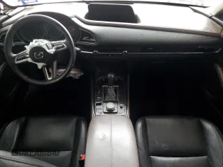 2023 Mazda CX-30 S Premium with VIN 3MVDMBDM0PM527234, listed as a Copart auction lot 43534975 with 77,240 mi miles and Non Repairable. Bid and sale history available at DreamBid. Image 8.