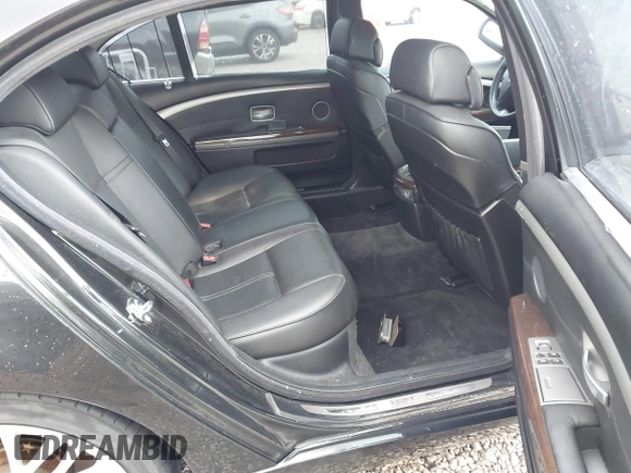 2007 BMW 7 Series 750Li with VIN WBAHN83577DT77290, listed as a IAAI auction lot 41908957 with 164,215 mi miles. Bid and sale history available at carsss.com. Image 8.