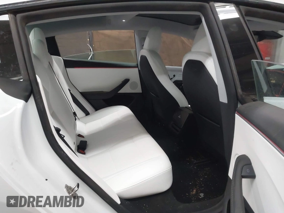2024 Tesla Model 3 with VIN 5YJ3E1EA9RF836300, listed as a IAAI auction lot 41988009 with 9,989 mi miles. Bid and sale history available at carsss.com. Image 8.