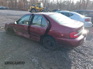 2000 Nissan Altima XE with VIN 1N4DL01D8YC189295, listed as a IAAI auction lot 41109066 with 15,221 mi miles and . Bid and sale history available at DreamBid. Image 3.