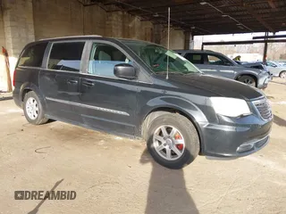 2012 Chrysler Town & Country Touring z VIN 2C4RC1BG2CR159420, wystawiony jako IAAI lot #41035284 z przebiegiem 142 529 mil mil oraz . Historia ofert i sprzedaży dostępna na DreamBid. Obrazek 1.