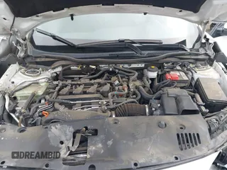 2021 Honda Civic Sport with VIN SHHFK7H42MU419784, listed as a IAAI auction lot 42202495 with 55,958 mi miles and . Bid and sale history available at DreamBid. Image 10.