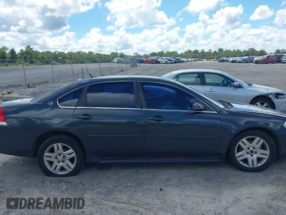 2014 Chevrolet Impala LT with VIN 2G1WB5E31E1146318, listed as a IAAI auction lot 40413281 with 422,345 mi miles and . Bid and sale history available at DreamBid. Image 13.