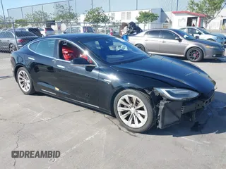 2016 Tesla Model S 90D with VIN 5YJSA1E21GF148336, listed as a IAAI auction lot 42304073 with 149,340 mi miles and . Bid and sale history available at DreamBid. Image 1.